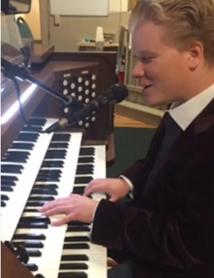 Jason Castonguay playing the organ and singing